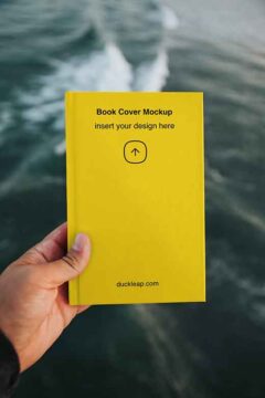 Hardcover Book in Hand Mockup