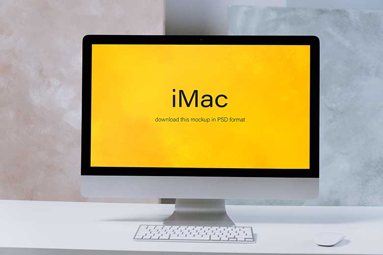 Free iMac on a White Table Mockup